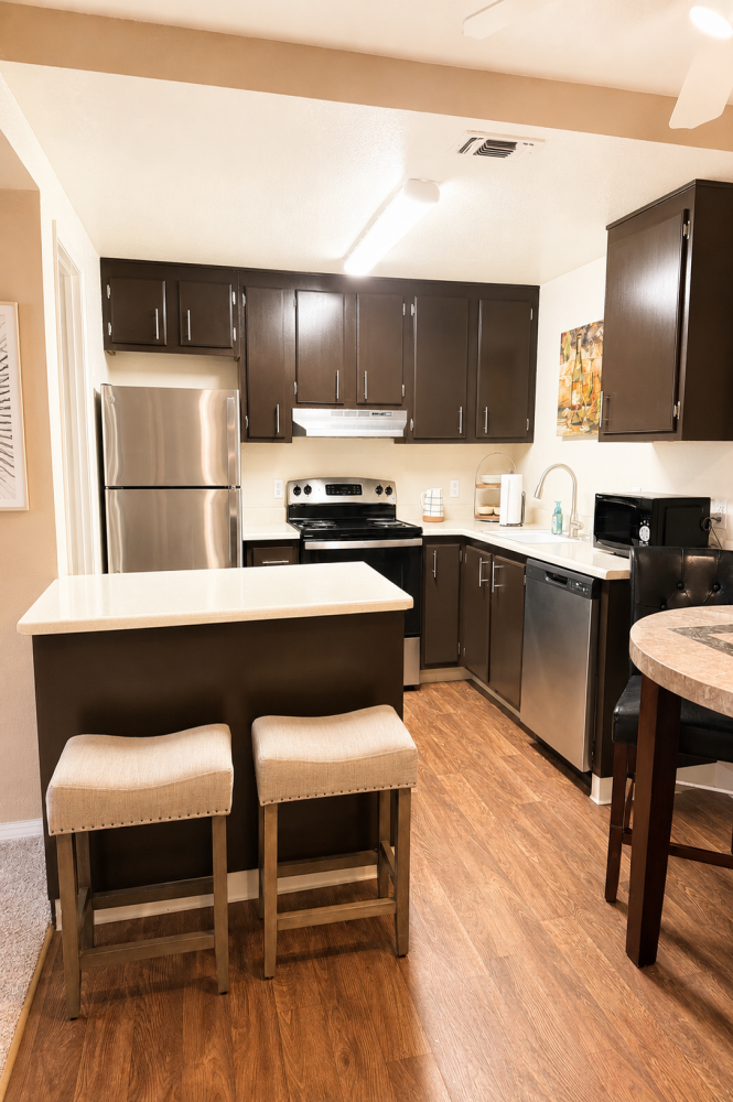 This Living, kitchen, dining 5 photo can be viewed in person at the Walnut Village Apartments, so make a reservation and stop in today.